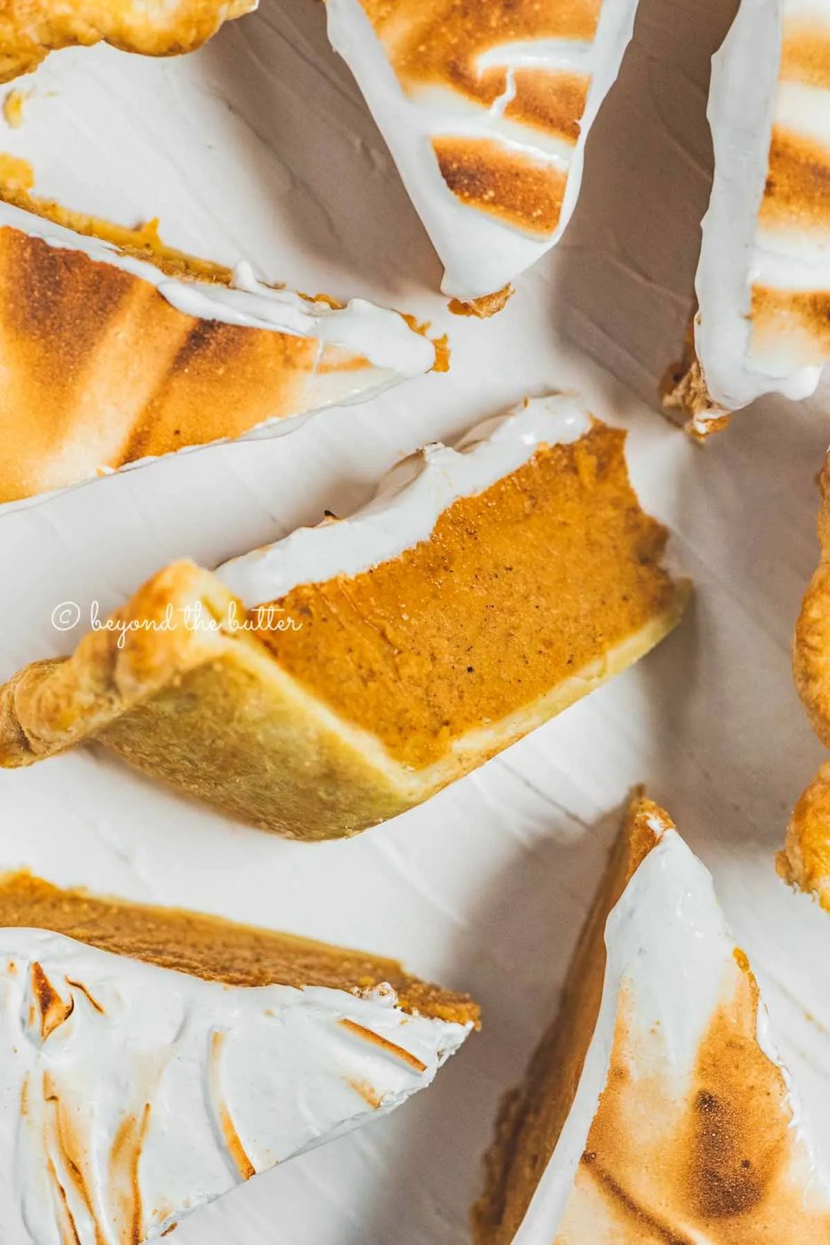 Slices of brown sugar sweet potato pie with center slice on its side | All Images © Sovuh