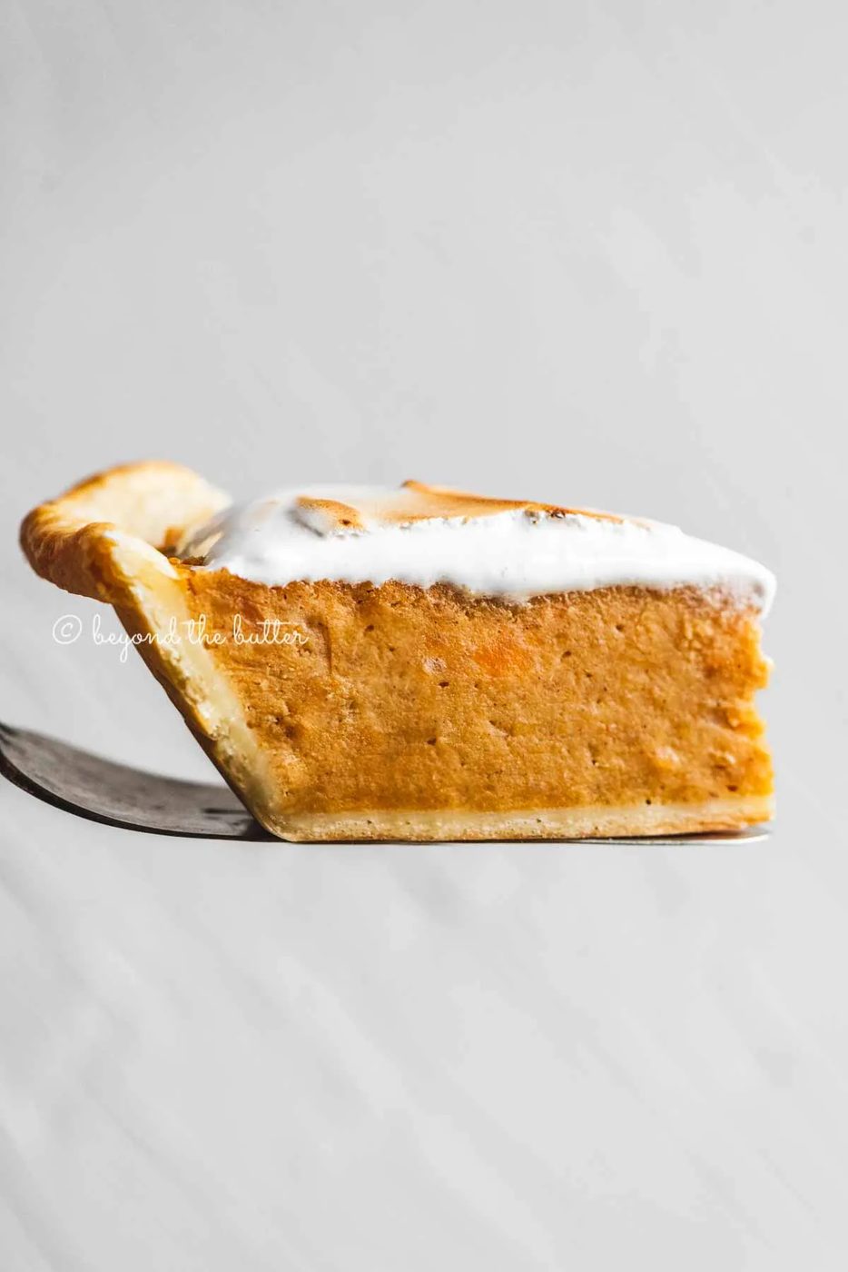 Side view of sweet potato pie slice from Sovuh | All Images © Sovuh