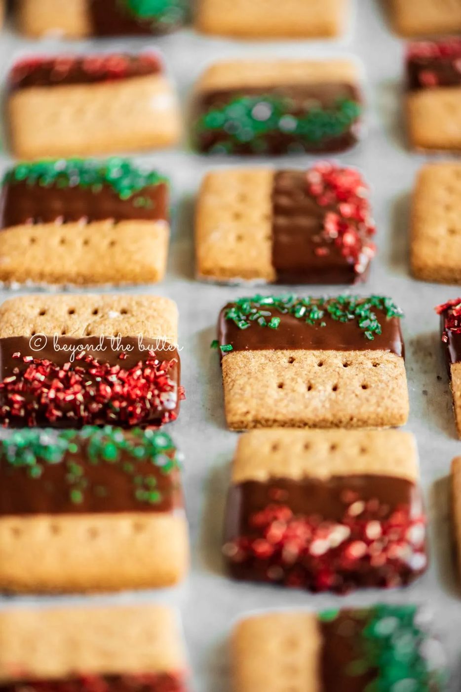 Image of Chocolate Dipped Graham Cracker Sqaures on a cookie sheet | © Sovuh