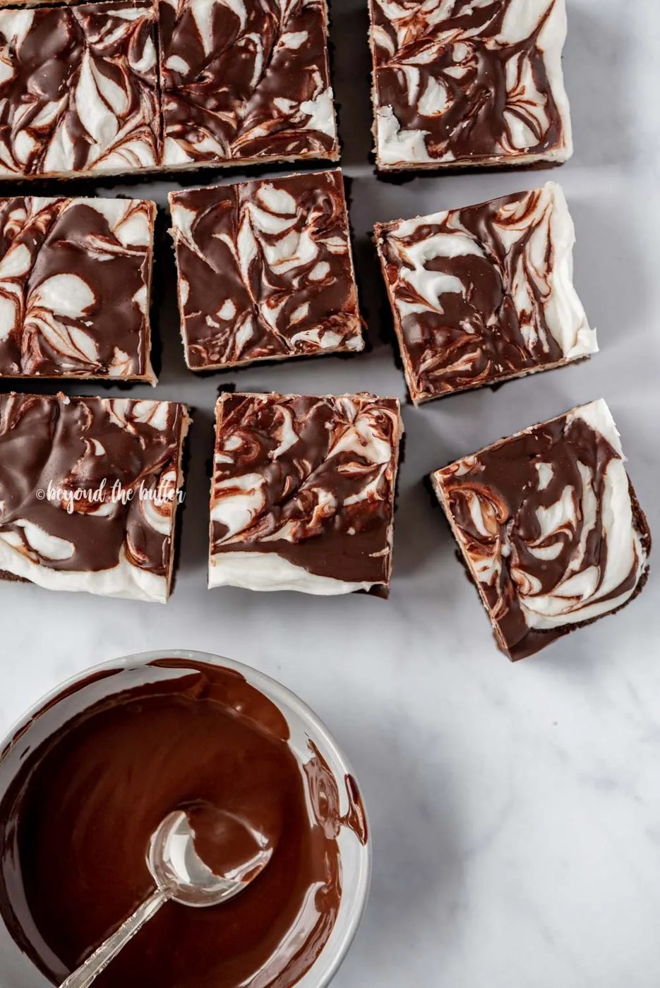 Squares of Chocolate Peppermint Swirled Brownies | All Images © Sovuh, LLC