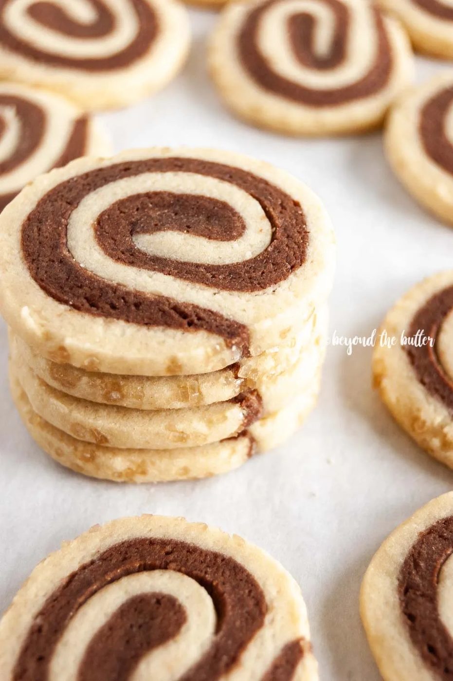 Close up image of small stack of Chocolate Pinwheel Cookies | All images © Sovuh