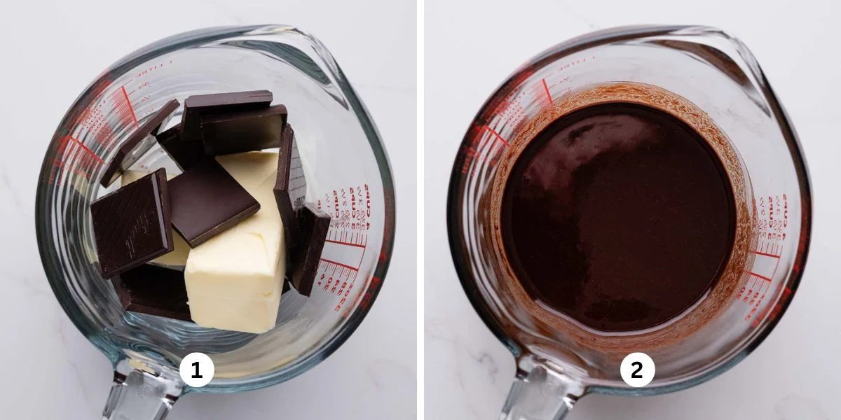 Melting a stick of butter and dark chocolate squares together in a large glass measuring cup on a white marbled background.