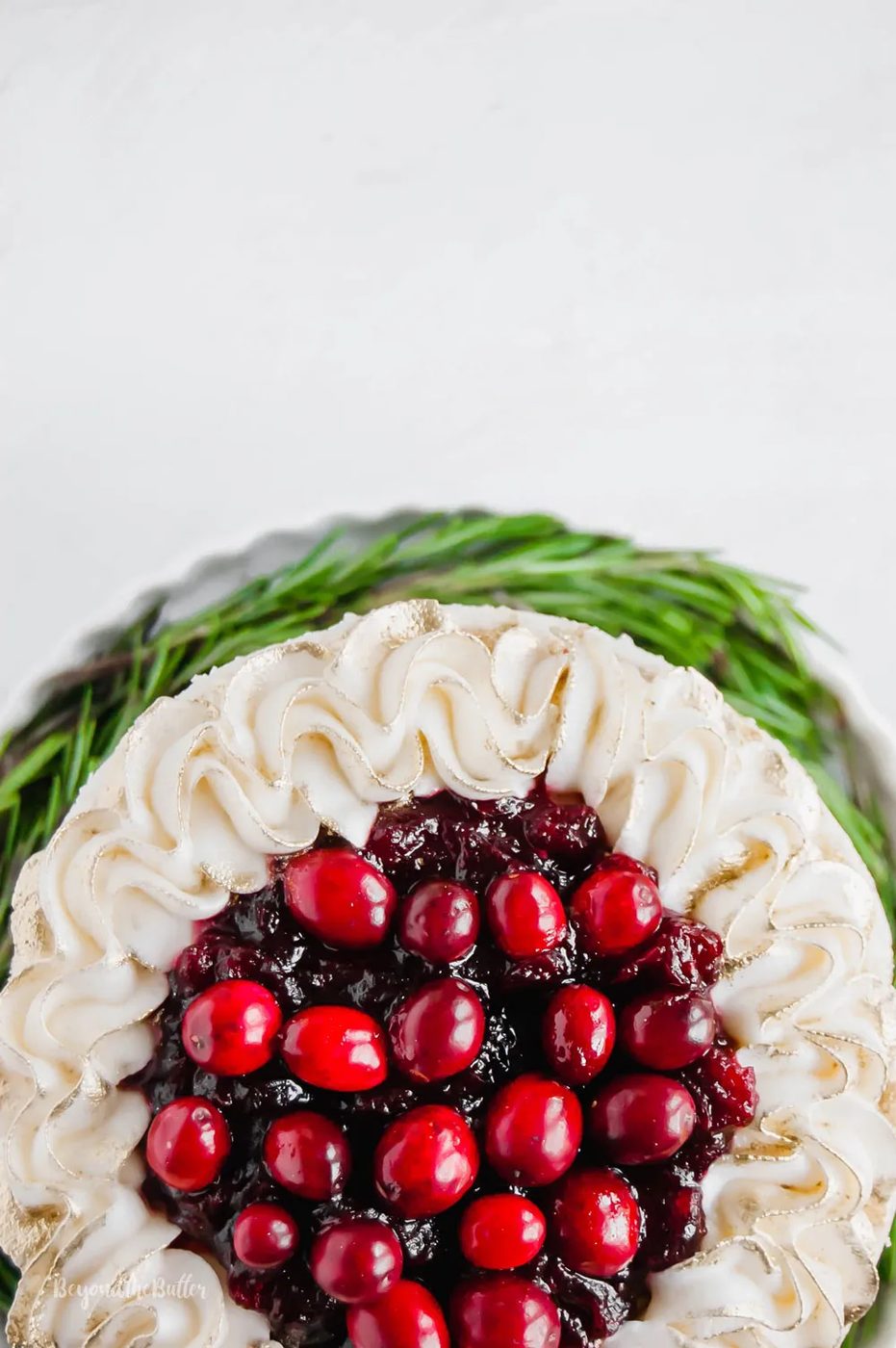 Gingerbread Cake | Overhead photo of Gingerbread Cake with Maple Buttercream Frosting and Cranberry Compote | Image Credit: Sovuh, LLC