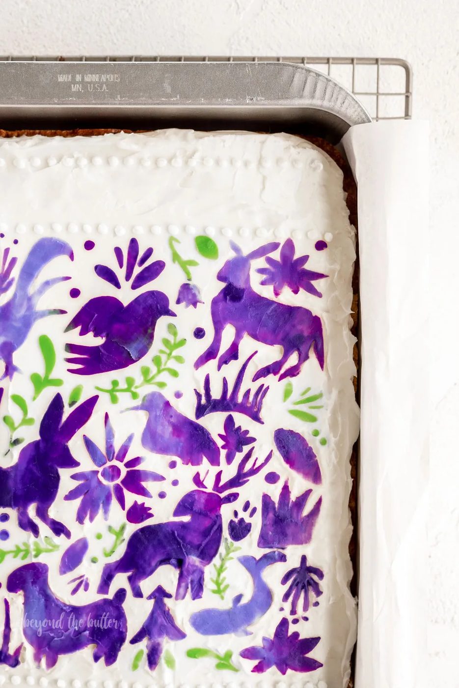 So tender and flavorful, and filled with flavors of cinnamon, nutmeg, banana, and pineapple — that is this Hummingbird Sheet Cake. Top it with this silky White Chocolate Cream Cheese Frosting and you have yourself the perfect dessert! (stencil from Martha Stewart line at Michaels) #hummingbirdsheetcake #sheetcake #Sovuh #creamcheesefrosting #marthastewart