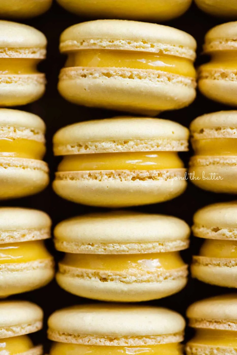 Close up of lemon bar macarons on side | All Images © Sovuh