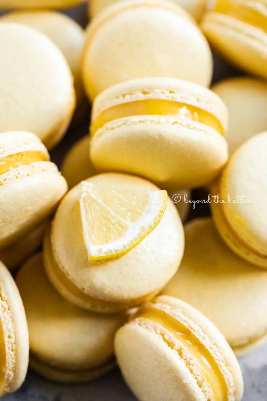Close up of lemon bar macarons on side | All Images © Sovuh
