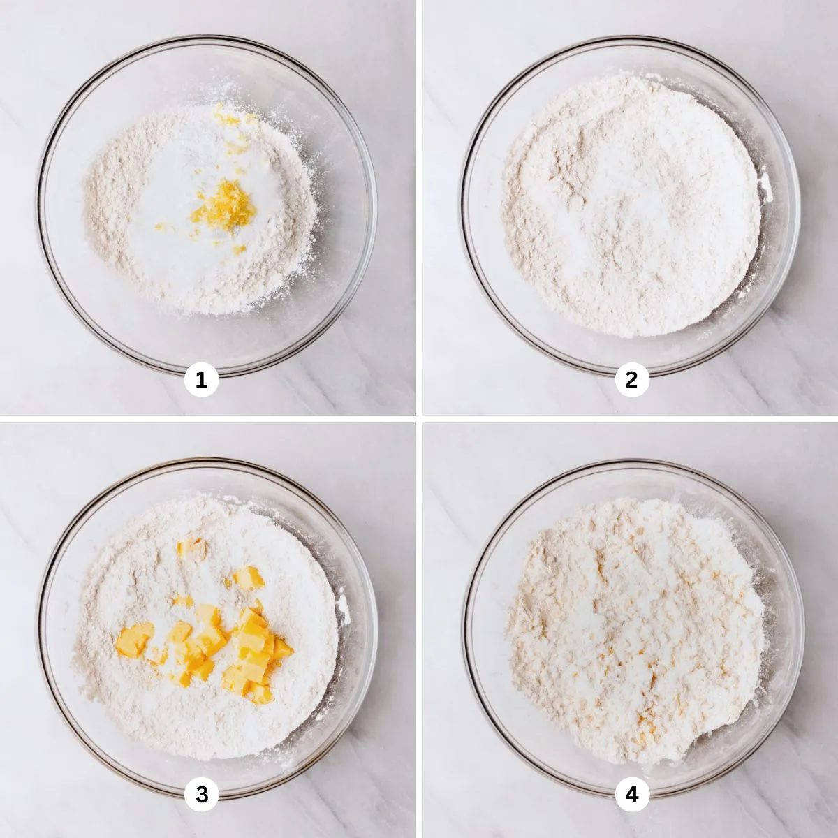 Mixing the dry ingredients together in a glass mixing bowl then adding in the cubed cold butter mixing until fully combined.