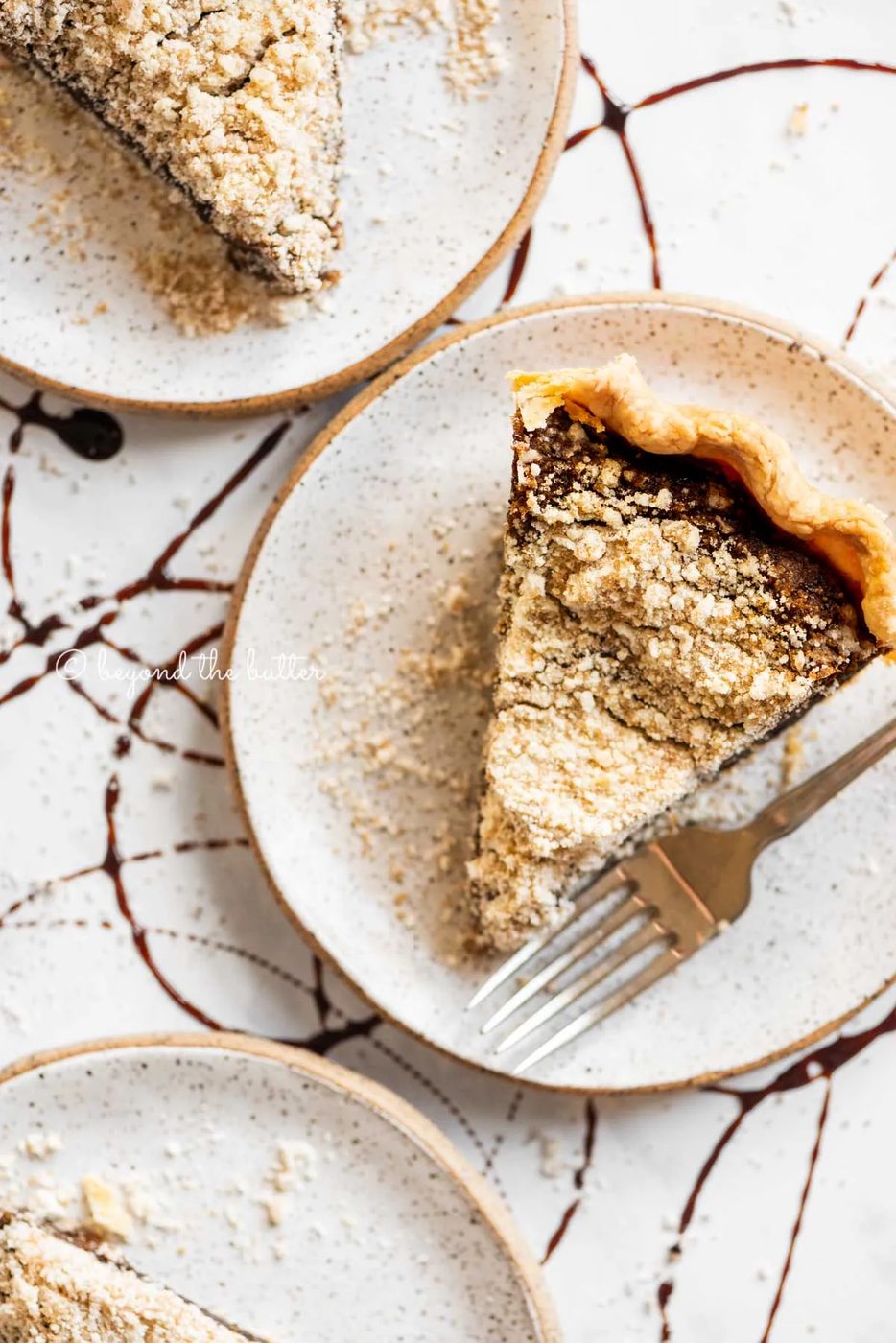 Slices of shoo fly pie on dessert plates | All Images © Sovuh