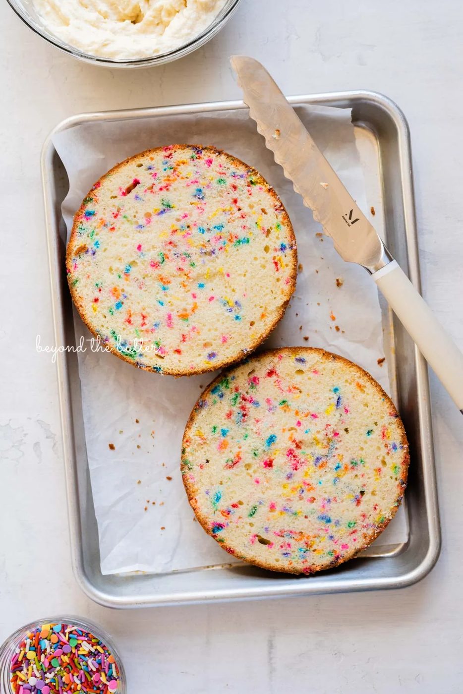 6 inch single layer funfetti cake sliced into two layers with a serrated knife from Sovuh.com | All images © Sovuh