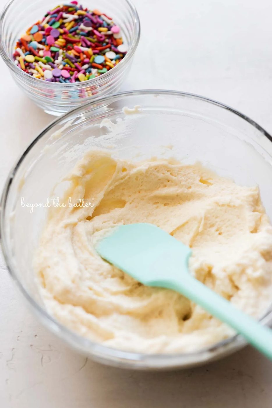 Small batch vanilla fluor buttercream frosting ready for the rainbow jimmies from Sovuh.com | All images © Sovuh