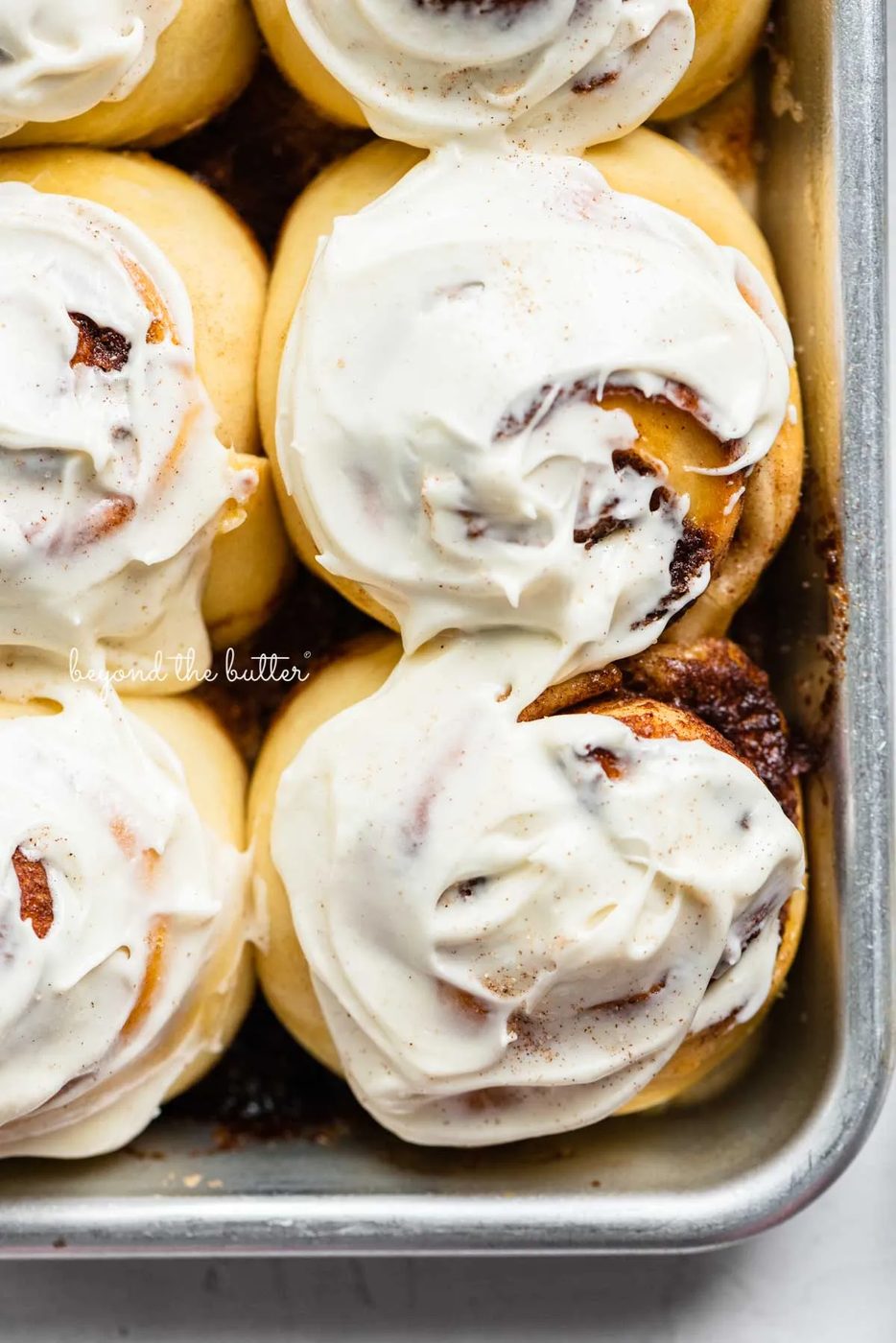 Just frosted small batch cinnamon rolls from Sovuh.com | © Sovuh