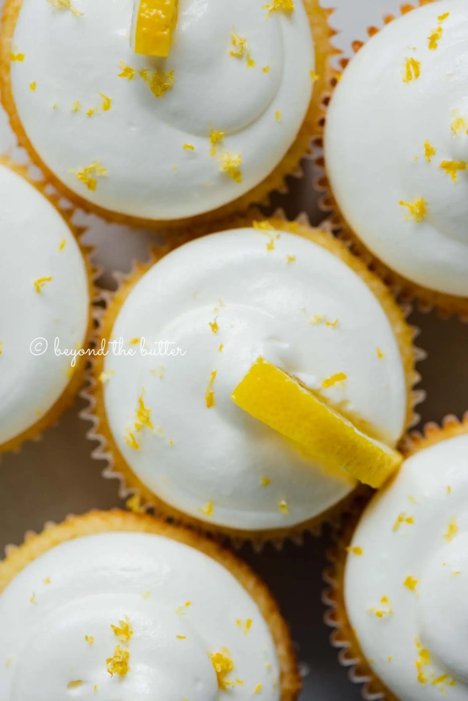 Close up of decorated small batch lemon cupcakes | All Images © Sovuh