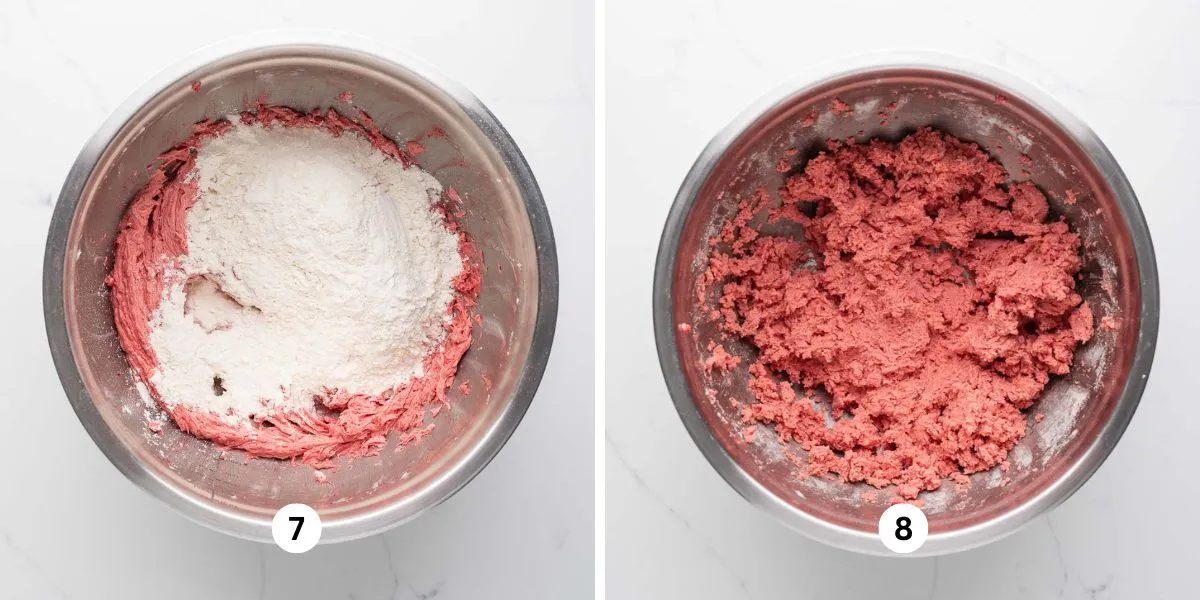 Adding flour mixture to wet ingredients in a stainless steel mixing bowl on a white marbled background.