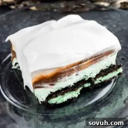 A piece of mint oreo dessert on a plate.