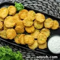 Zucchini Fritte on a black platter