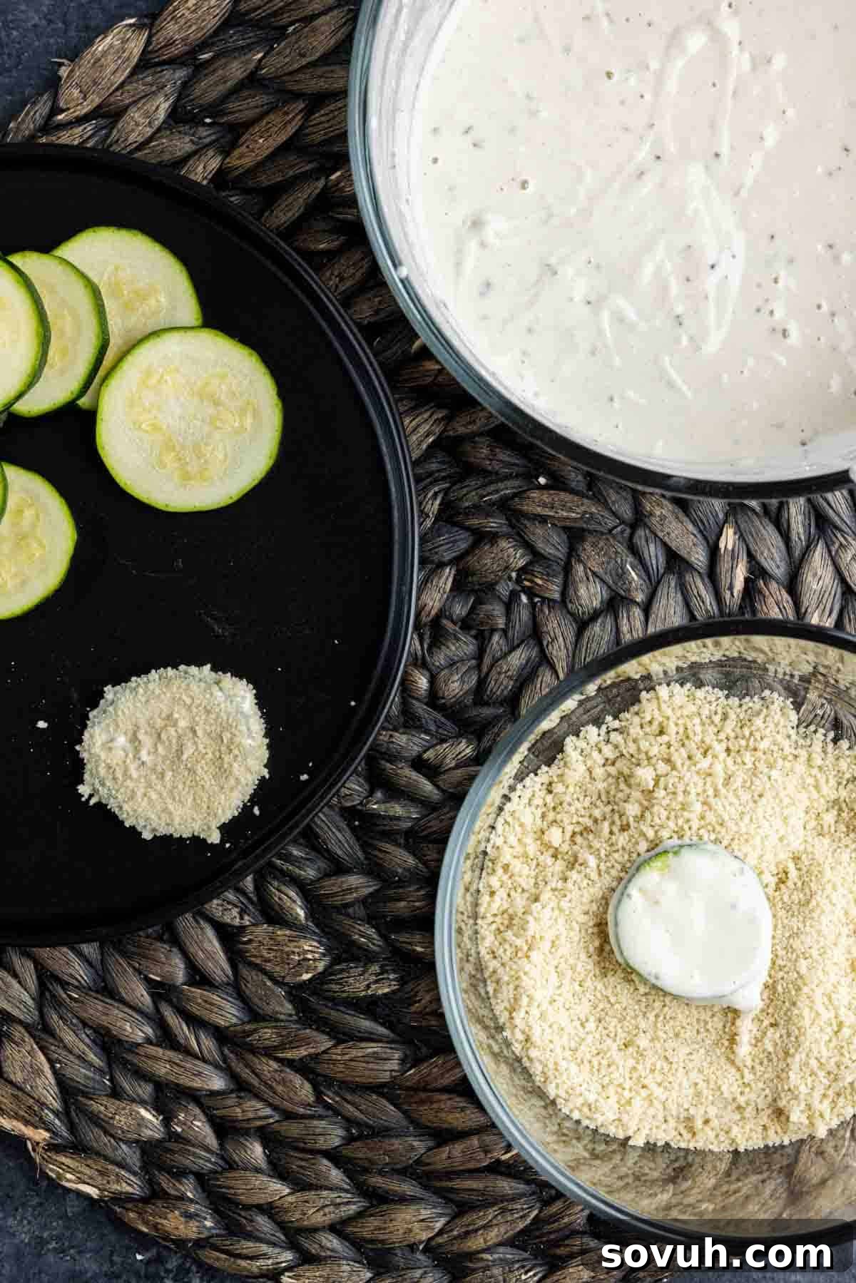 How to dip zucchini into batter and then panko breadcrumbs for frying.