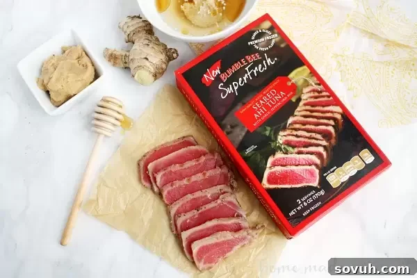 This light and fresh seared tuna salad is a healthy lunch option mixed with mangoes and avocados and topped with a Miso vinaigrette.