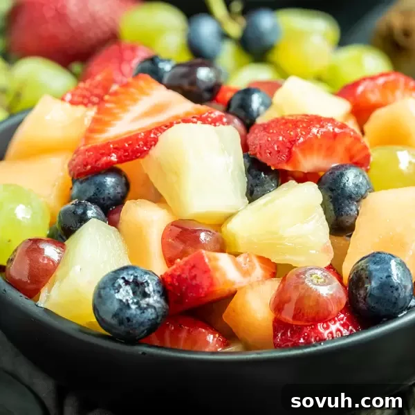 Lemonade Fruit Salad in a black bowl