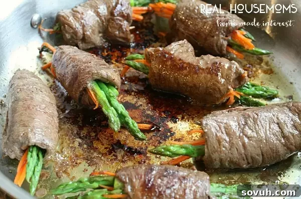 Pan-searing Balsamic Steak Roll Ups in olive oil for a delicious, crispy exterior.
