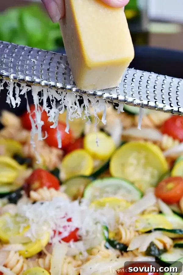 One Pot Summer Vegetable Pasta with grated cheese