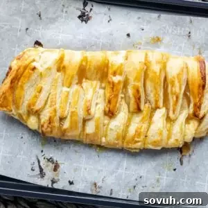 Lemon Cream Cheese Danish on parchment paper and baking sheet