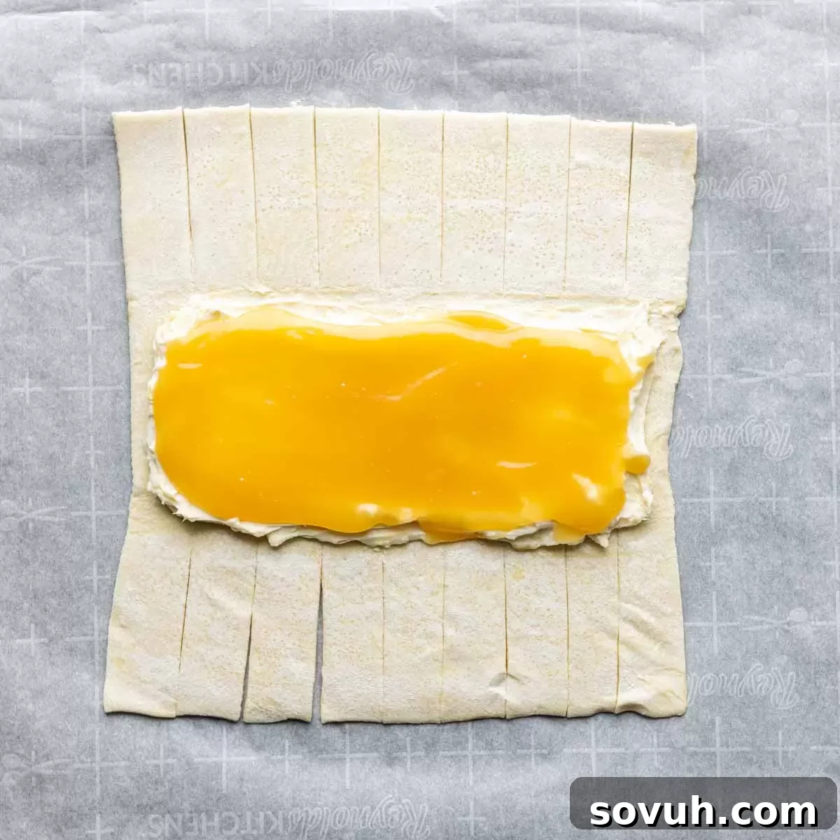 filling a Lemon Cream Cheese Danish