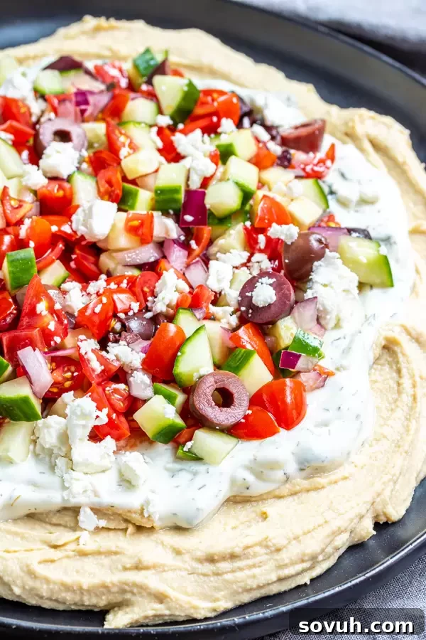 Large platter showcasing the delicious 5 Layer Greek Dip