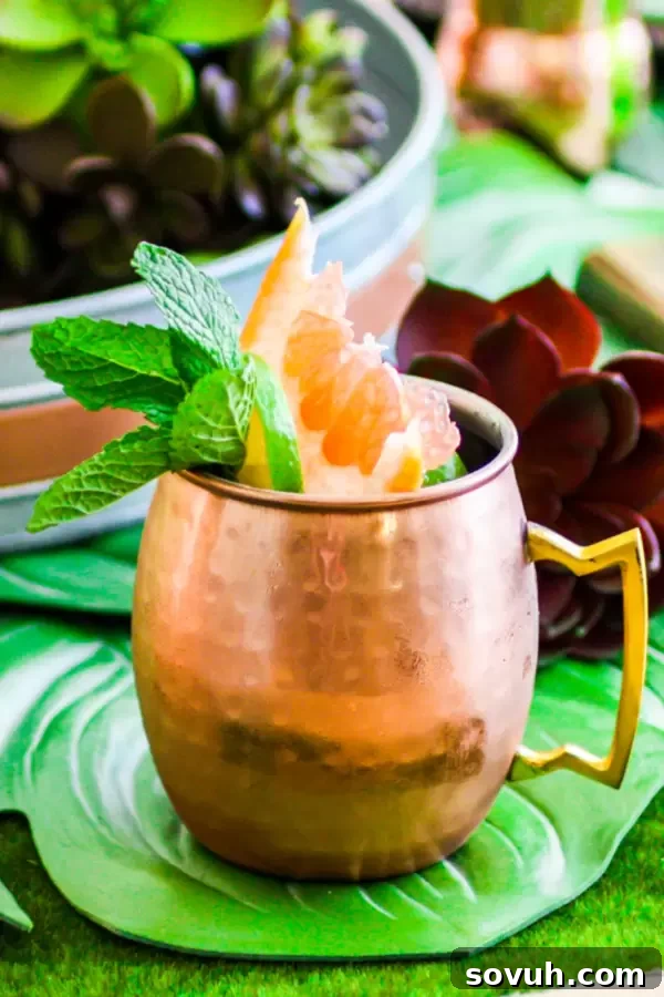 Citrus Moscow Mule garnished with fresh grapefruit and lime