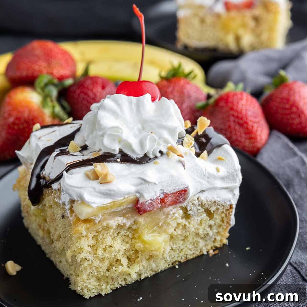slice of Banana Split Cake on a plate