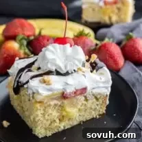slice of Banana Split Cake on a plate