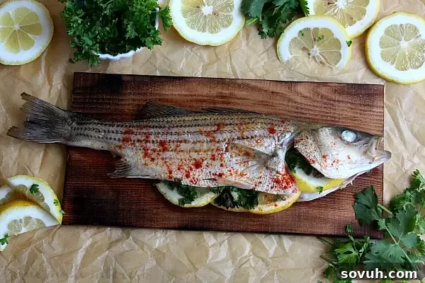 A delightful cedar plank grilled fish ready to be served, highlighting its golden skin and tender interior. A perfect healthy seafood meal.