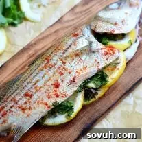 Cedar Plank Grilled Fish, a delightful and easy grilled whole fish recipe, perfect for a healthy summer meal.