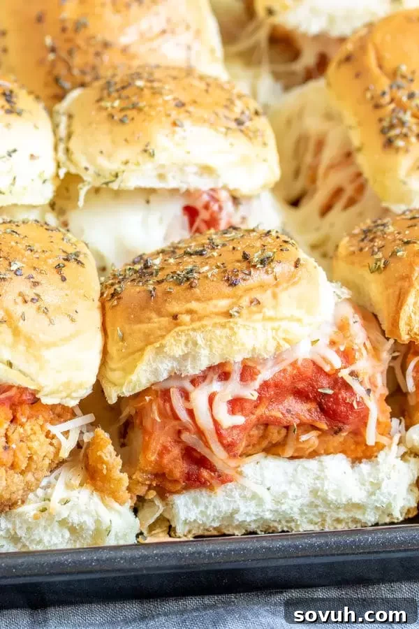 Crispy Chicken Parm Sliders 5 Chicken Parmesan Sliders as a game day appetizer, ready for hungry guests