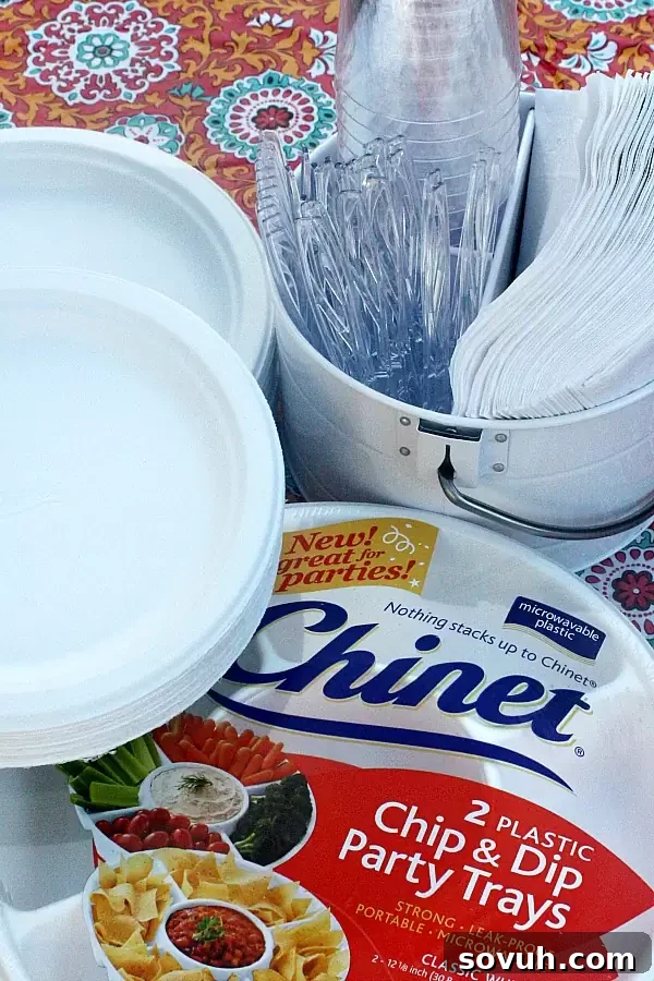 A close-up of the delicious No-Bake Lemon Meringue Dip, showcasing its fluffy texture and golden-toasted meringue topping. Ideal for parties, this easy summer dessert is served with crisp graham crackers and cookies.