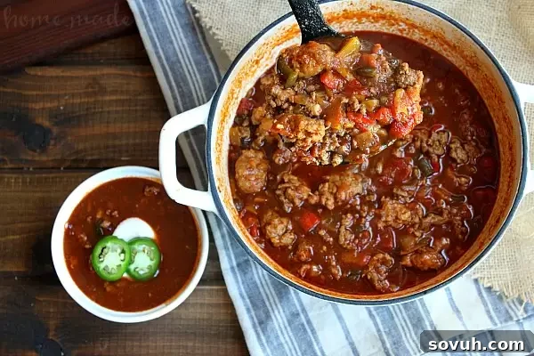 Easy chili recipe made with Pale Ale beer. Not made in the crock pot but on the stove top is perfect for your game day party this football season. Craft beer is a huge trend so this Pale Ale Chili is sure to be a hit. This game day chili is hearty and full of flavor.