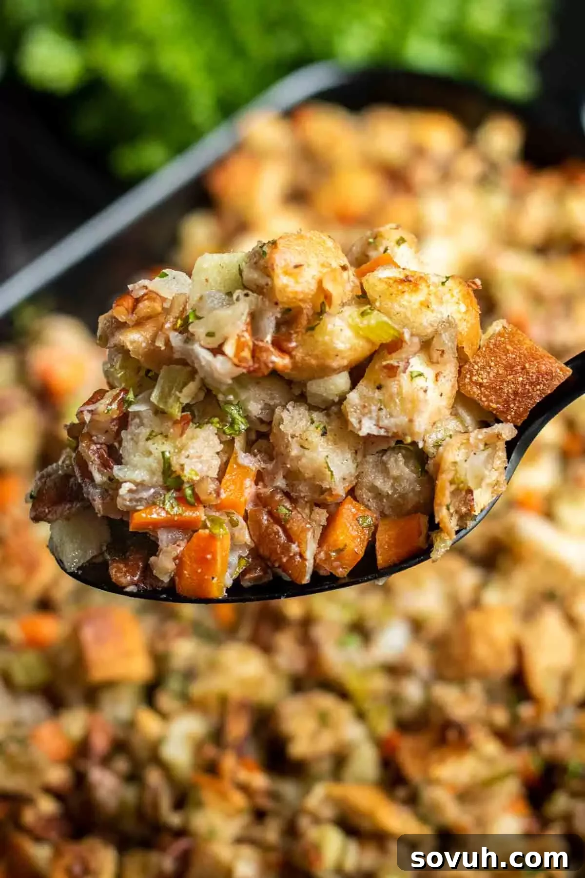 pecan apple stuffing on a spoon