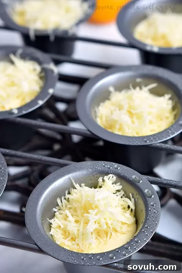 These Gruyere Popovers are an incredibly easy and impressive bread recipe, perfect for holiday gatherings like Thanksgiving or Christmas dinner. With their fluffy texture and cheesy flavor, they're sure to disappear quickly from any dinner party table.