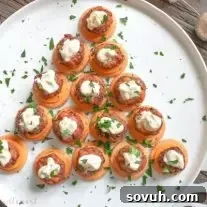 Mini Crab Cake Bites presented on a Christmas tree shaped platter