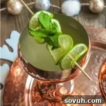 Champagne Moscow Mule with copper accents, perfect for parties.