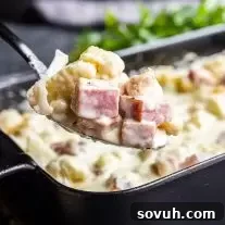 Keto Chicken Cordon Bleu Casserole on a spoon