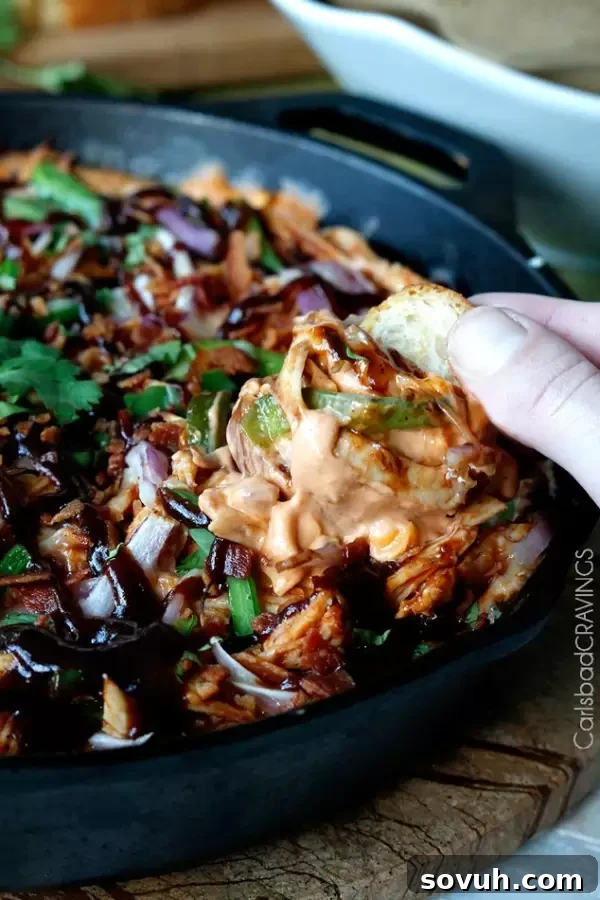 Hearty BBQ Chicken Pizza Dip, a savory and irresistible football party appetizer.