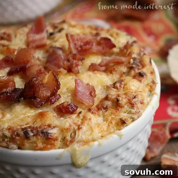 Creamy Bacon Artichoke Dip, a rich and savory football party appetizer.