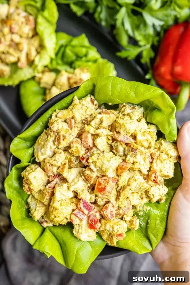 holding a bowl of Curried Chicken Salad