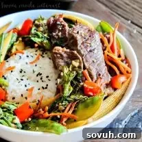 Sheet Pan Beef Teriyaki in a bowl, showcasing the cooked beef and vegetables, ready to eat.