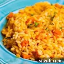 Vibrant Carrot Orzo, a creamy pasta dish perfect for spring and Easter.