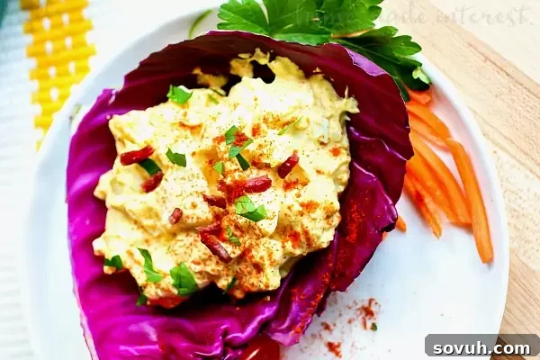 Bacon Cheddar Egg Salad | Need something to do with those Easter leftovers? This Bacon Cheddar Egg Salad is a low carb recipe that uses up all of those hard-boiled eggs you have leftover from Easter. Bacon Cheddar Egg Salad combines bacon, eggs, and cheddar cheese to make an easy Easter brunch recipe or a low carb recipe you can take for lunch or make for dinner all year long. 