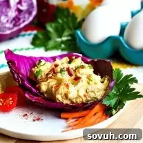 Bacon Cheddar Egg Salad | Need something to do with those Easter leftovers? This Bacon Cheddar Egg Salad is a low carb recipe that uses up all of those hard-boiled eggs you have leftover from Easter. Bacon Cheddar Egg Salad combines bacon, eggs, and cheddar cheese to make an easy Easter brunch recipe or a low carb recipe you can take for lunch or make for dinner all year long.