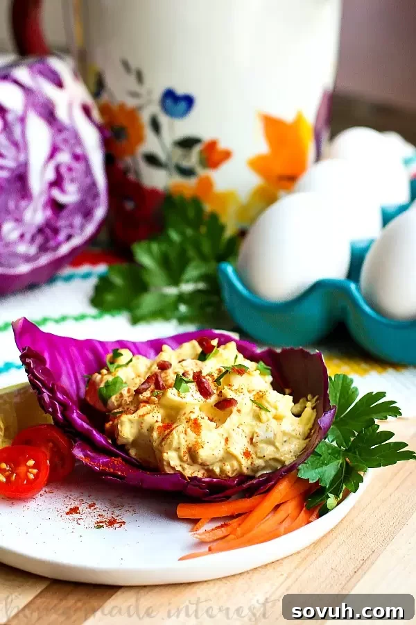 Bacon Cheddar Egg Salad | Need something to do with those Easter leftovers? This Bacon Cheddar Egg Salad is a low carb recipe that uses up all of those hard-boiled eggs you have leftover from Easter. Bacon Cheddar Egg Salad combines bacon, eggs, and cheddar cheese to make an easy Easter brunch recipe or a low carb recipe you can take for lunch or make for dinner all year long. 