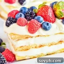 Lemon Berry Napoleons, a perfect easy lemon dessert recipe with puff pastry and fresh fruit.