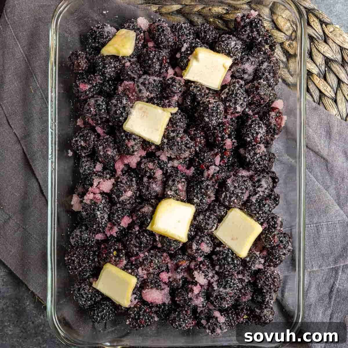 sugared blackberrys in dish to make easy blackberry cobbler